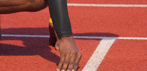 Close up of runner's hands during start of track event