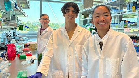 From left to right, iGEM team members Meaghan SmithTheo Seah, Keane Deas, 