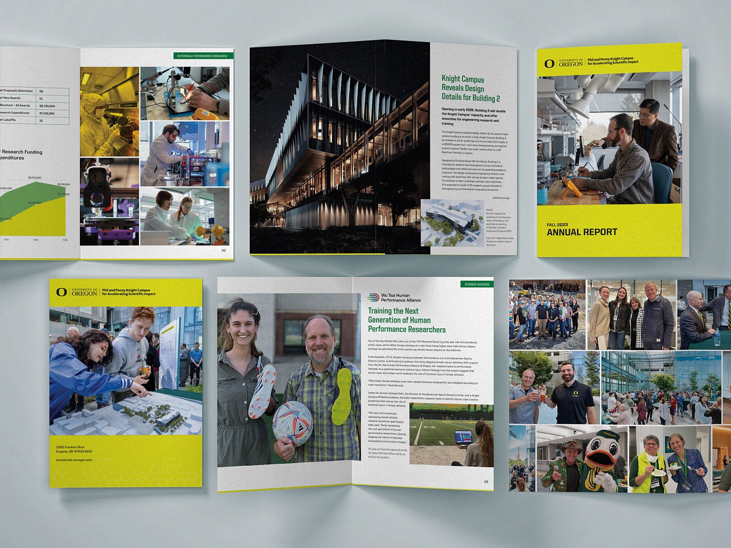Desktop with pages from Knight Campus Annual Report laid out